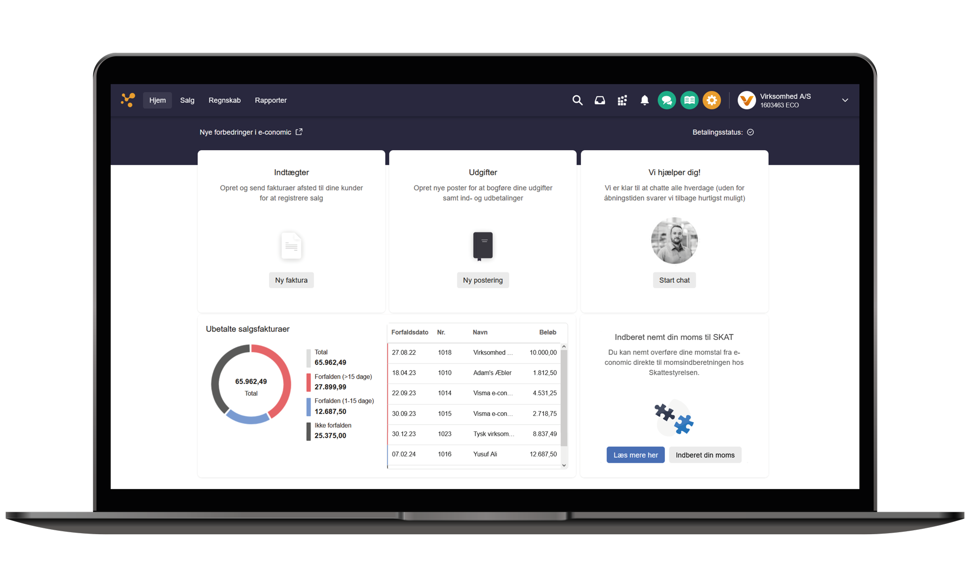 En computer med e-conomic på skærmen